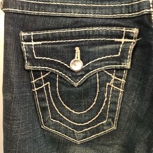 True Religion Disco Becky Big 7 indigo blue jeans with clear crystal buttons.